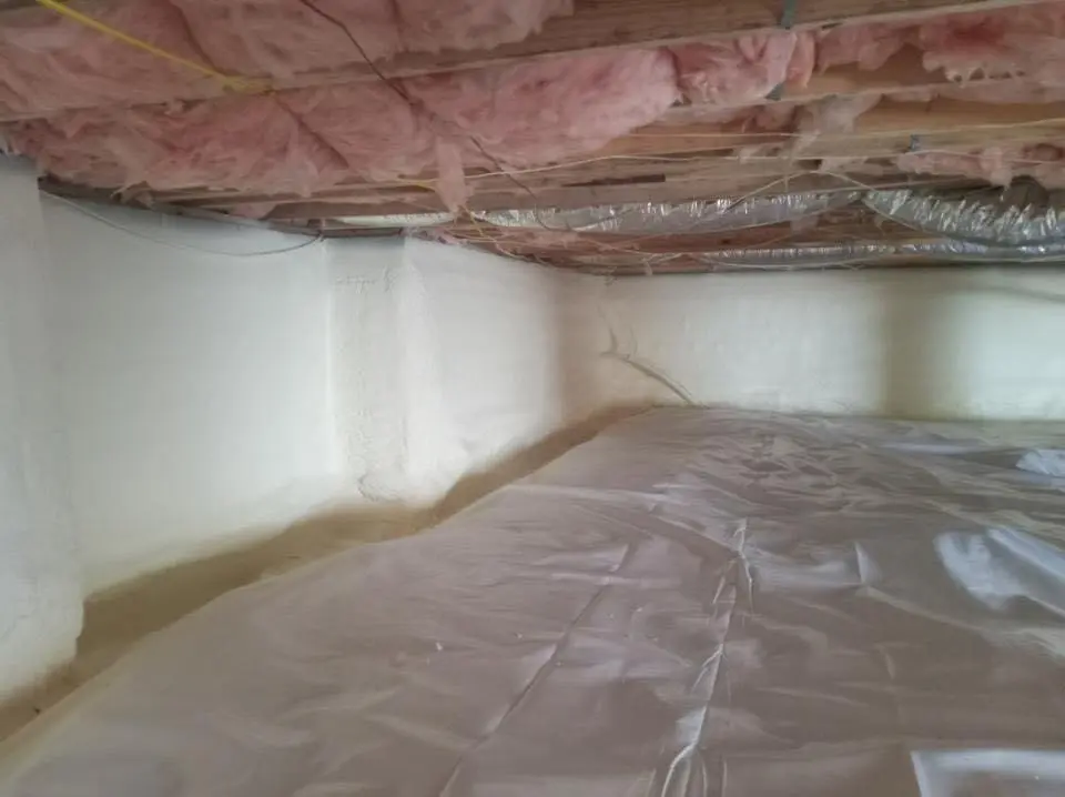 Crawl space encapsulation with closed-cell spray foam for Spray Foam Roofing in Champlain